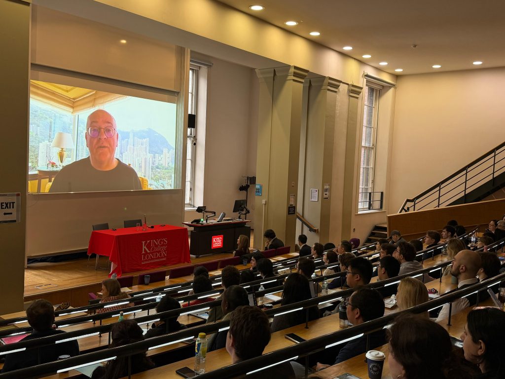 Auditorium watching keynote at YCW-KCL China Conference