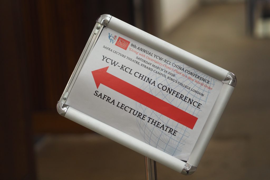 Sign pointing to YCW-KCL China Conference